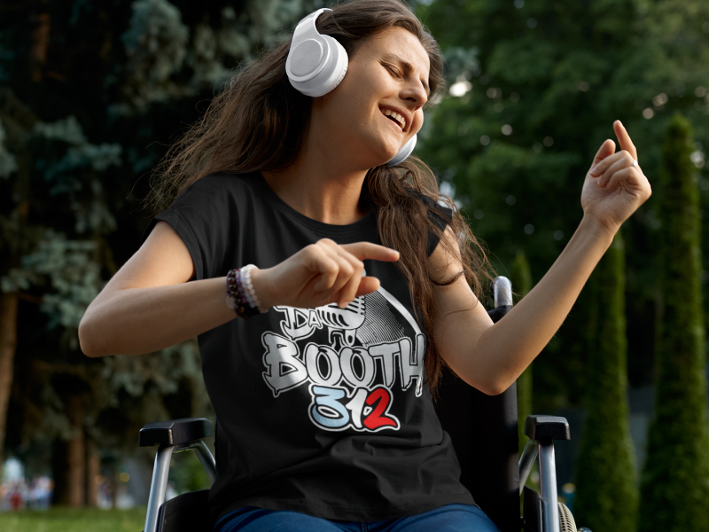 t-shirt-mockup-of-a-woman-using-a-wheelchair-while-enjoying-some-music-m17376-r-el2